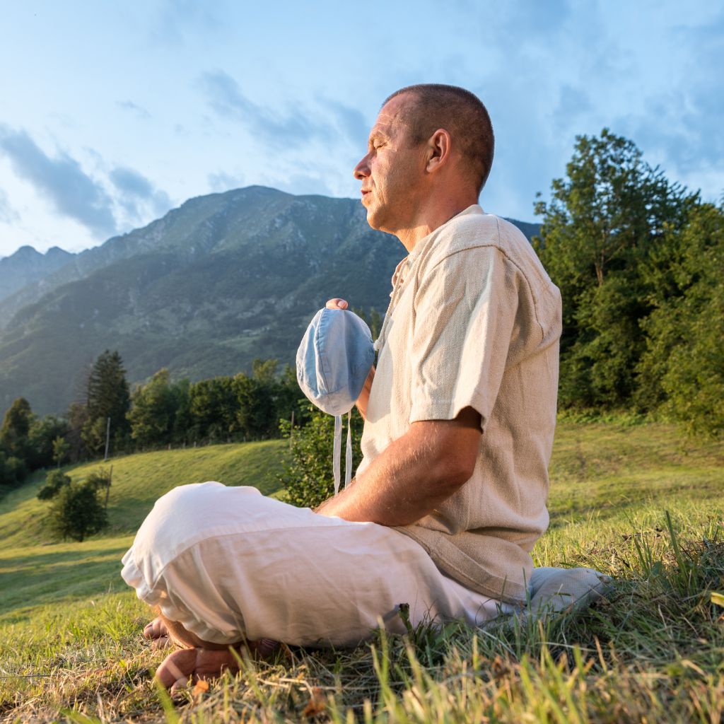 Practicing mantra meditation to discipline the restless mind